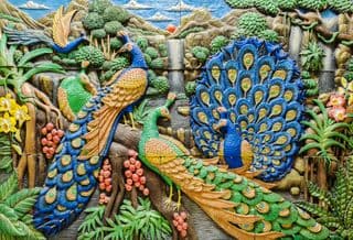 Vibrant Peacock Carvings in Thai Artistry