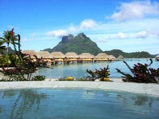 Overwater Bungalows at Pearl Beach Resort in Bora Bora