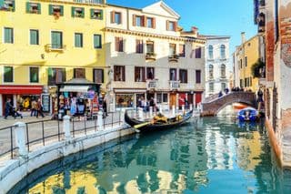 Gondola moored at Bridge of S.Simeone Piccolo in Venice