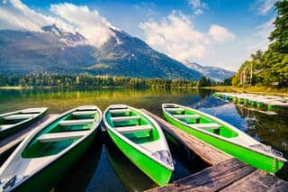 Green Rowboats Docked at Hintersee Lake
