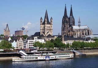 Paddle Steamer Goethe Docked at Cologne's Gothic Harbour