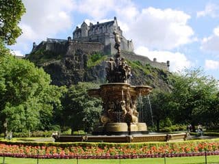Edinburgh Castle and the Ross Fountain in Princes Street Gardens