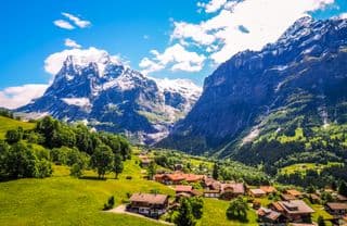 Snow-capped Peaks Overlooking Grindelwald Village