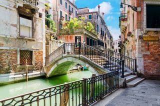 A Bridge Over the Narrow Canal in Venice