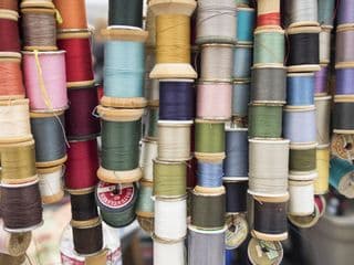 Assorted Wooden Spools of Sewing Thread