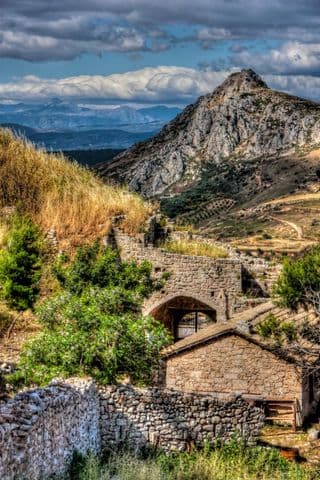 Ancient Stone Village Nestled Amongst Mountains