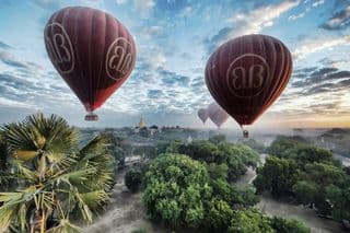 Hot Air Balloons Floating Over Ancient Temples of Bagan