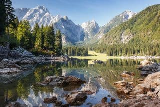 Reflective Lake Fusine in the Julian Alps, Italy