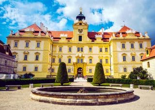 Valtice Castle: Baroque Elegance Under the Blue Sky