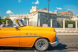 A Classic Yellow Cabriolet in Havana