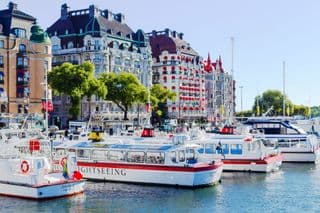Boats docked at Strandvägen Boulevard, Stockholm