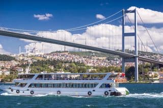 Boat Cruise Under the Bosphorus Bridge in Istanbul, Turkey