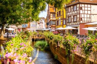Colorful Half-Timbered Houses Along the Waterway in Colmar, France