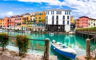 Charming Canal Scene in a Vibrant Italian Village