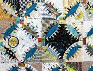 Patchwork Quilt with Blue Fish Patterns