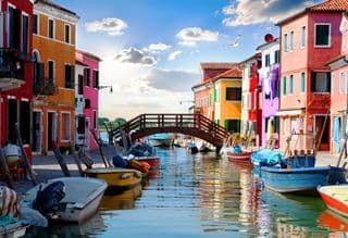 A Bridge Over Colorful Canals of Venice