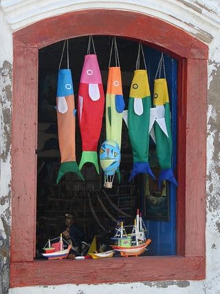 Colorful Fish Kites in an Arched Window Display
