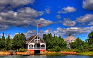 Nautical Elegance: Boathouse and Manor by the Water