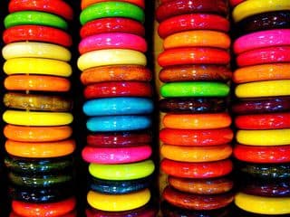 Stacked Wooden Bracelets in Vibrant Colors