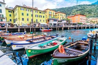 Boats at the Lake Garda Promenade in Torbole, Italy