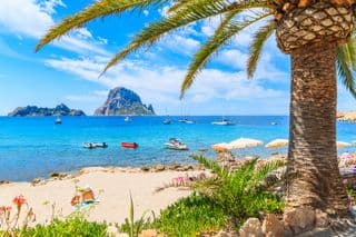 Ibiza's Cala d'Hort Beach: A Tropical Paradise
