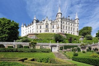 Elegant Dunrobin Castle amidst Scottish Highlands Beauty