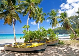 Tropical Boats at Takamaka Beach