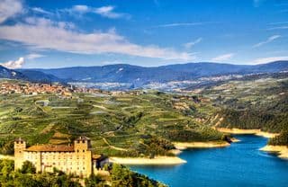 Medieval Castle amidst Vineyards in the Italian Alps