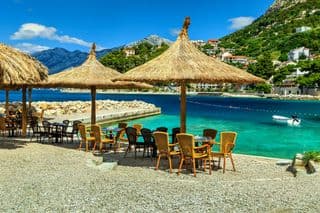 Straw Umbrellas Overlooking the Adriatic Sea
