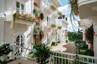 White Villas Amidst Blooming Gardens