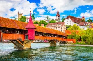 Covered Chapel Bridge over Reuss River in Lucerne