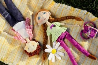 Handmade Doll Couple Lying on Blanket