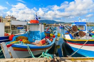 Brightly Painted Fishing Boats in the Greek Harbour of Samos