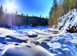 Winter Wonderland at Frozen Kiutaköngäs Rapids, Finland